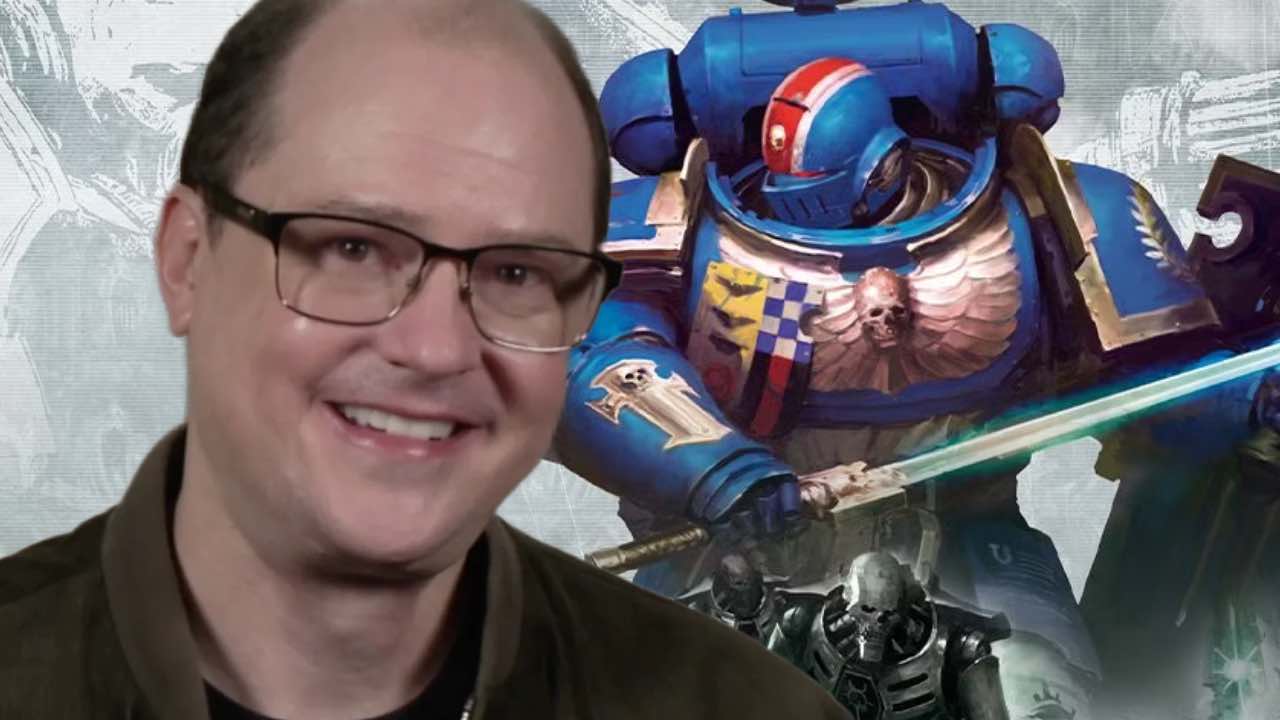 Mike Flanagan in front of Warhammer 40K key art